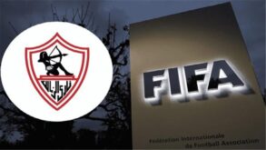 شعار نادي الزمالك مع خلفية توضح عقوبة إيقاف القيد من الفيفا